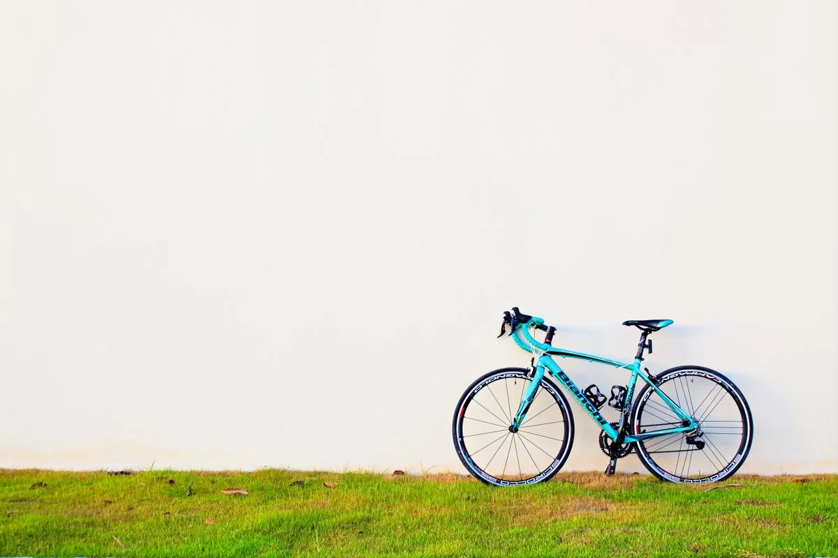 Turquoise drop-bar road bicycle