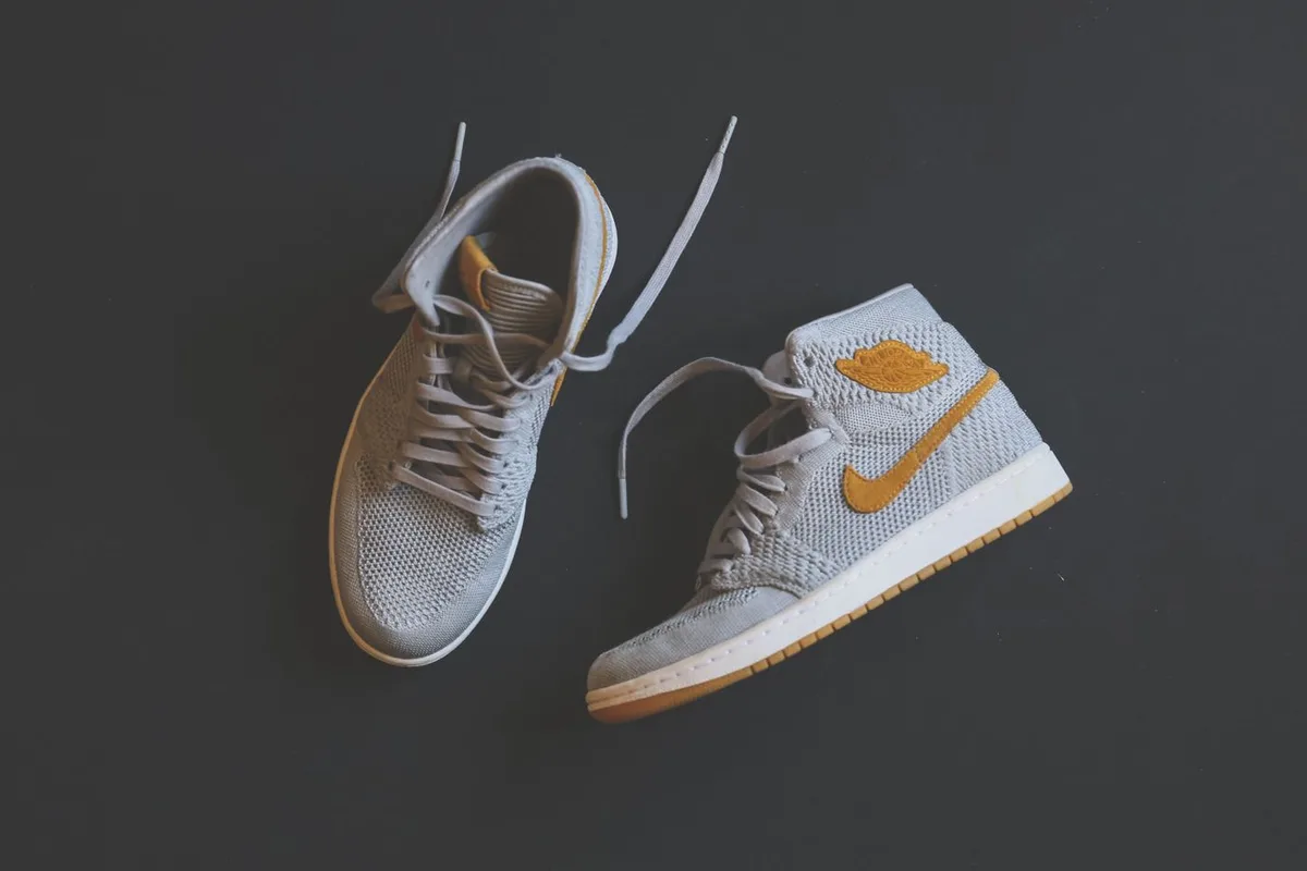 White and yellow high-top sneakers