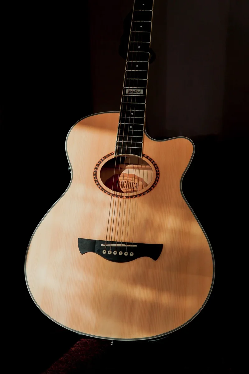 Natural-finish cutaway acoustic guitar