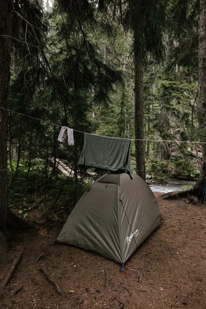 Olive-green backpacking tent