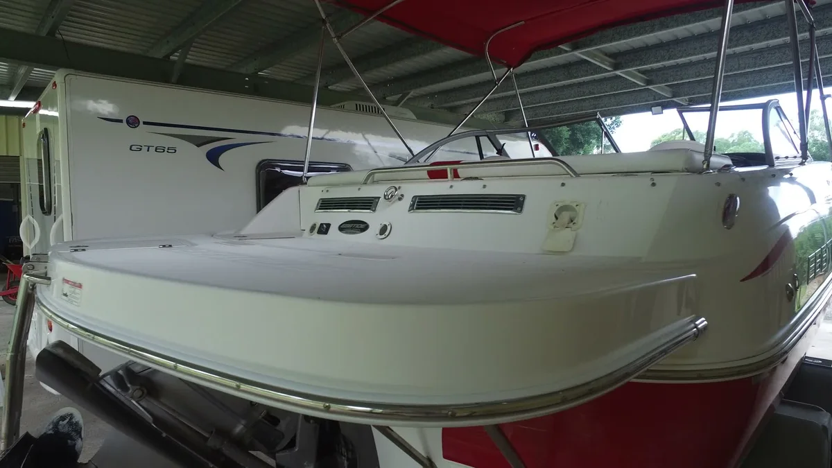 Trailerable cabin sailboat with trailer